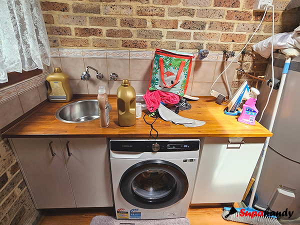 Old brick wall laundry before renovation