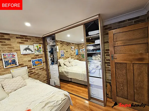 Original dark-toned sliding wardrobe before custom upgrade