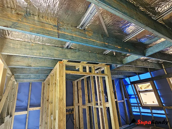 A newly built studio with blue sarking on the external wall and foil sarking on the roof