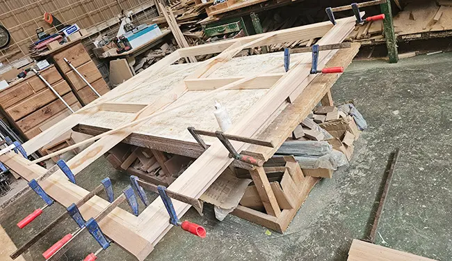 One custom solid oak bed frame is handcrafted