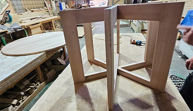 One handcrafted solid oak round dining table