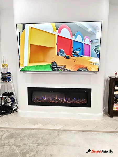 installed a new electric fireplace on the arch TV wall